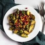 Roasted Brussels Sprouts with Pomegranates and Toasted Walnuts #pomegranate #brusselssprouts #tararochfordnutrition